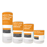 A collection of Medium Cotton Crepe Bandages in various sizes, displayed upright with their labels visible.