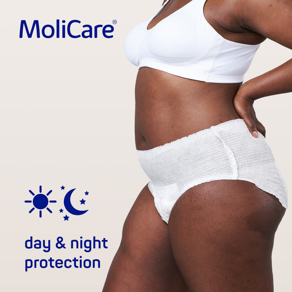 MoliCare Premium Mobile 6 Drops pull-ups on a woman, highlighting discreet and comfortable underwear designed for confidence